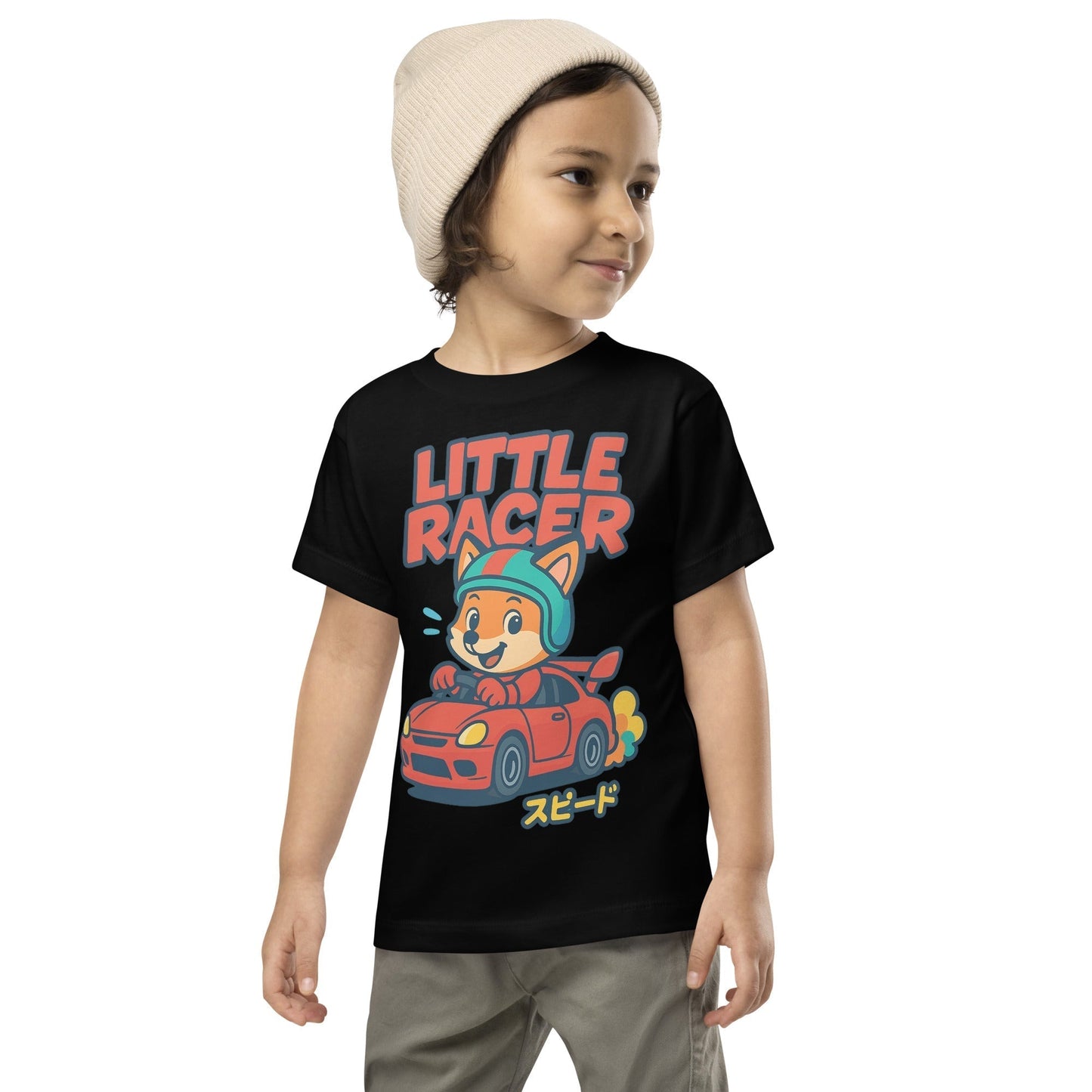 Toddler wearing black Little Racer Fox Tee with cartoon fox driving red sports car and Japanese speed text