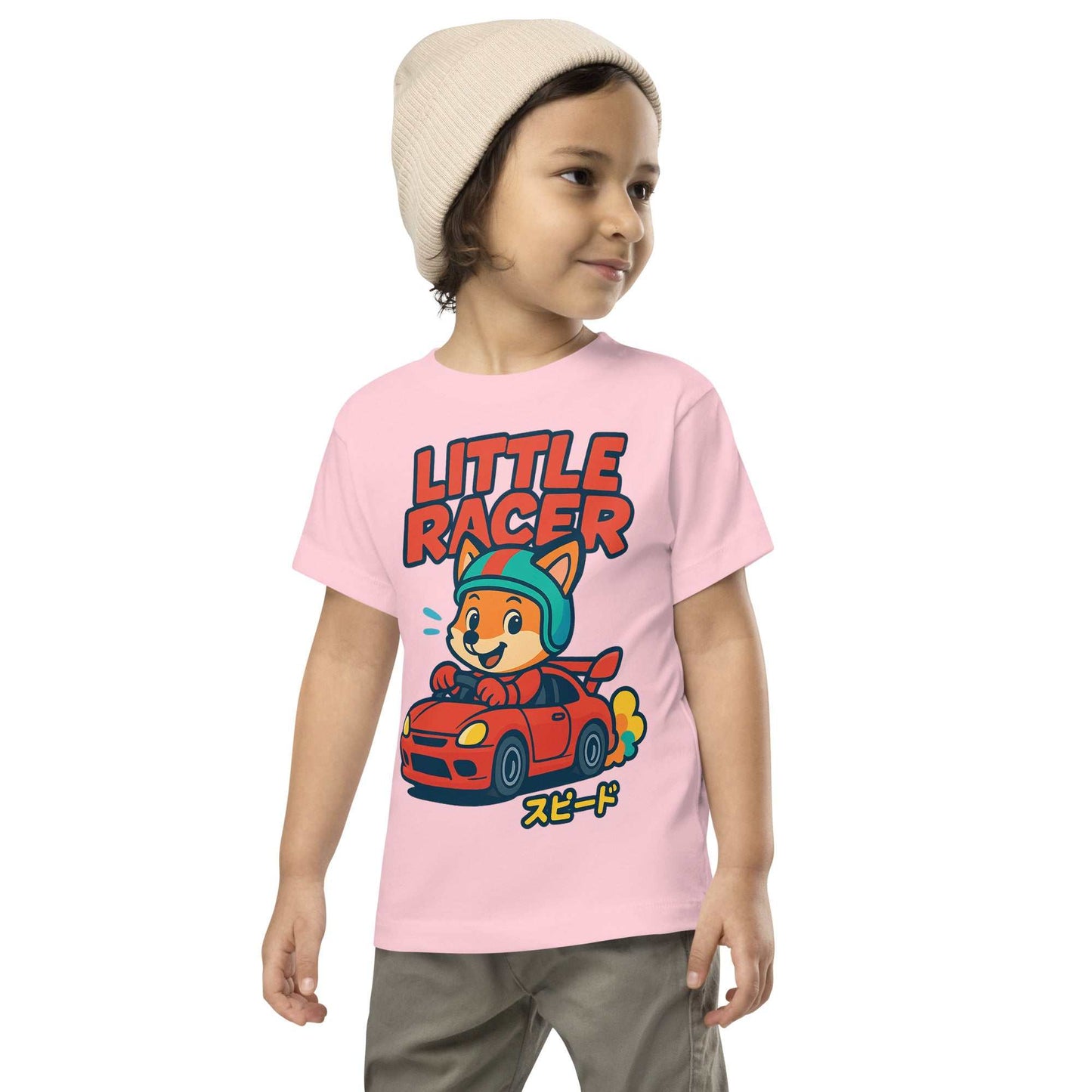 Toddler wearing pink Little Racer Fox Tee with cartoon fox driving red sports car and Japanese katakana text.
