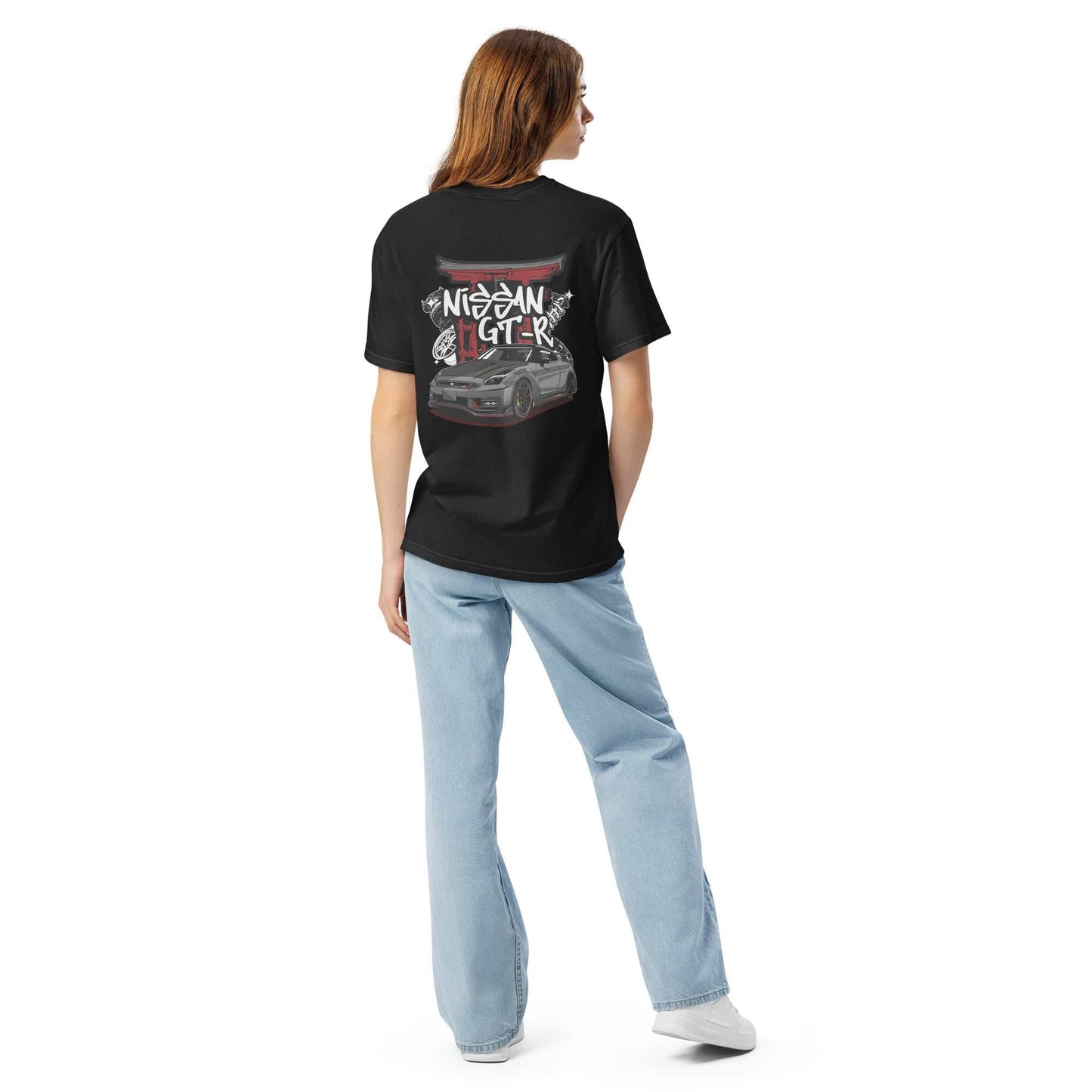 Woman wearing black Torii Titan GT-R Tee with Nissan GT-R graphic on back and light blue jeans