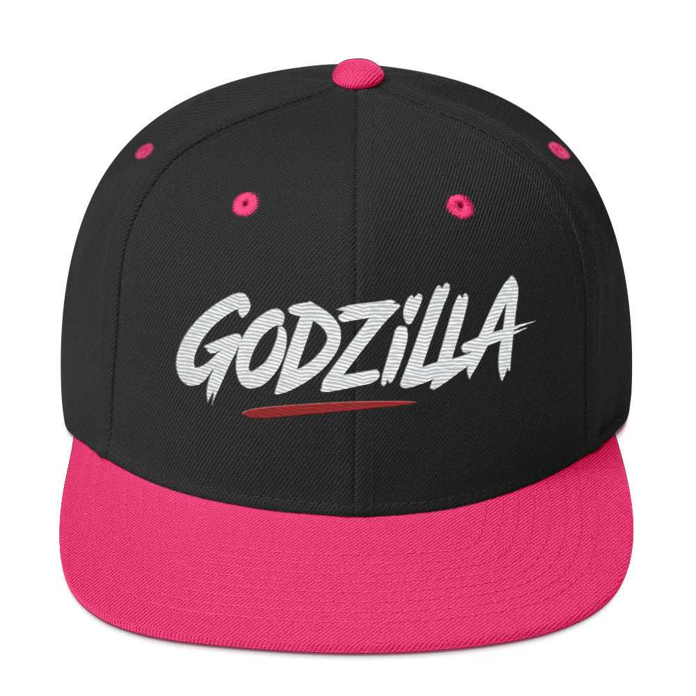 Black and pink Godzilla Flat Brim Hat with bold white "GODZILLA" lettering and adjustable snapback closure