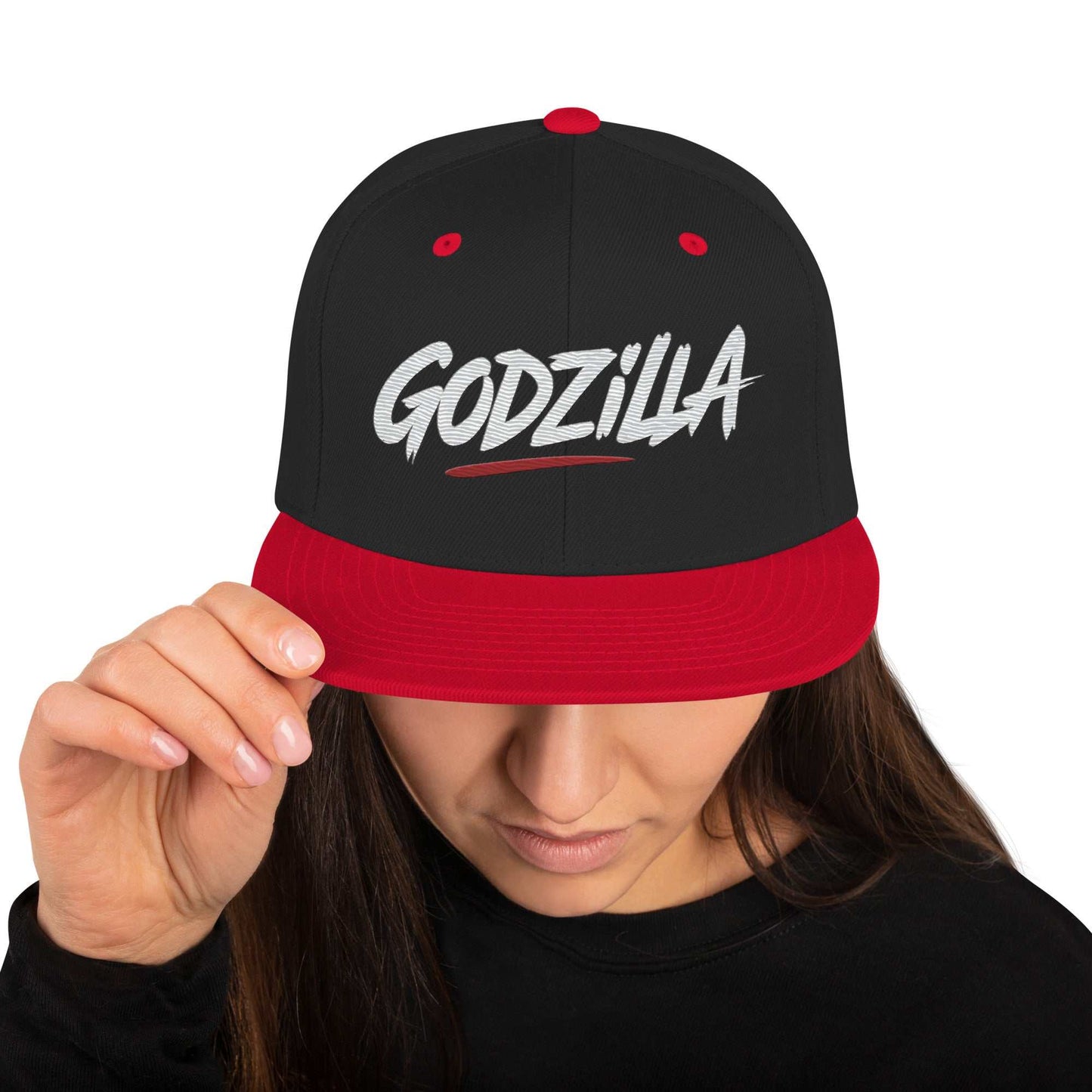 Woman wearing black and red Godzilla Flat Brim Hat with embroidered lettering
