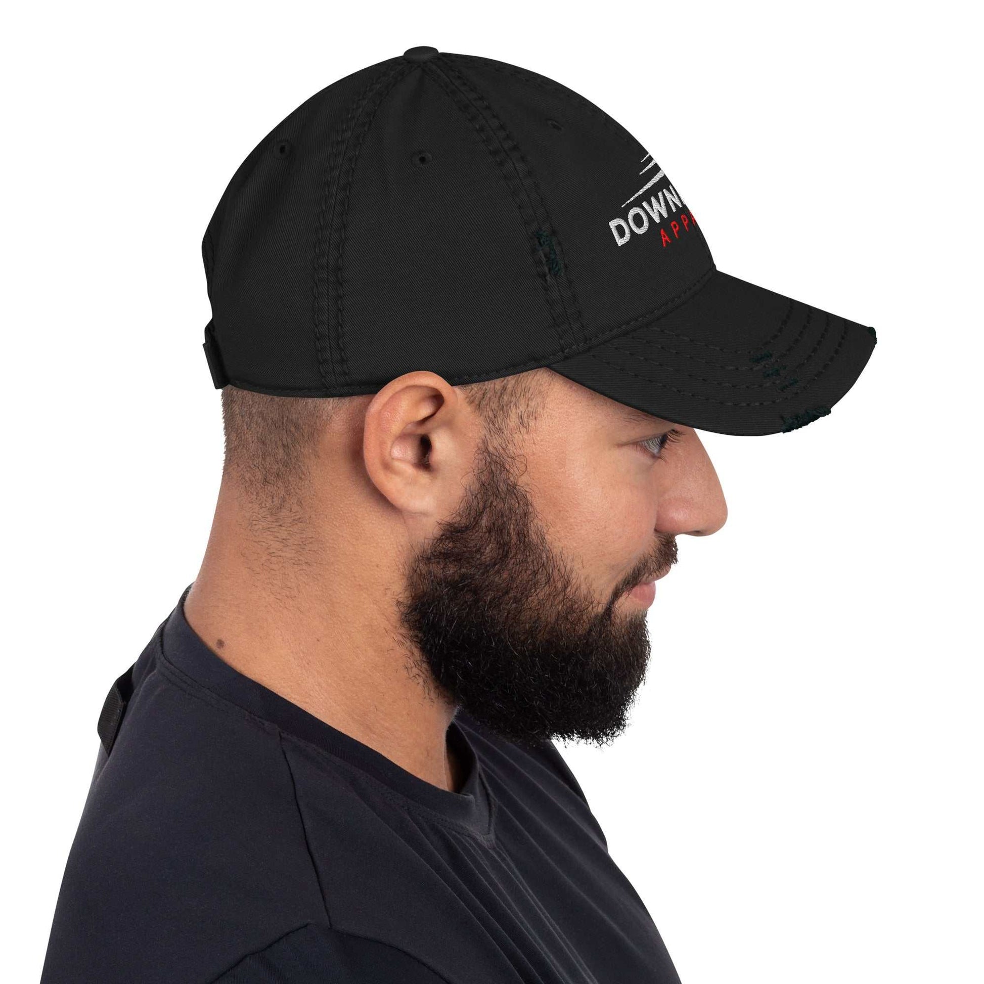 Black DownForce Apparel distressed dad hat worn by man with beard side view
