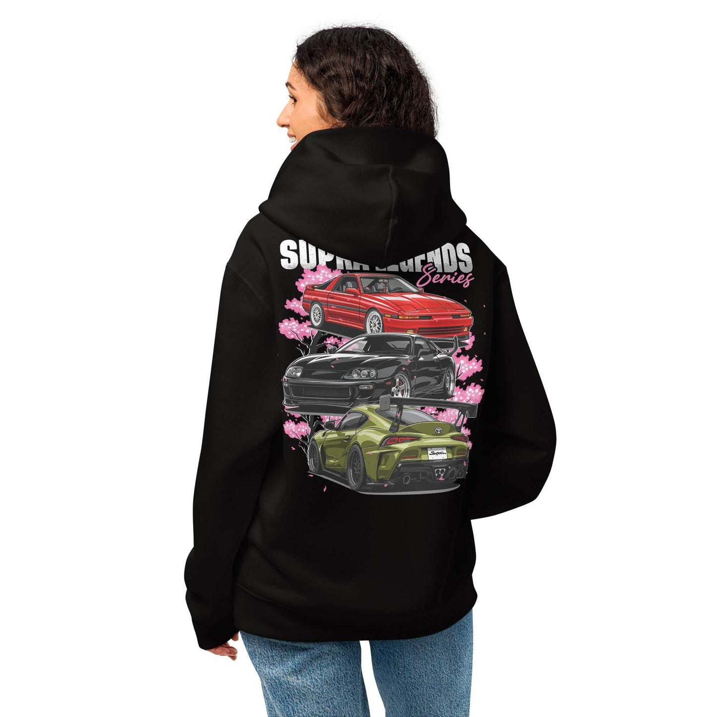 Black Supra Legends Series Hoodie with graphic of red, black, and green Toyota Supra cars and cherry blossoms on back worn by person